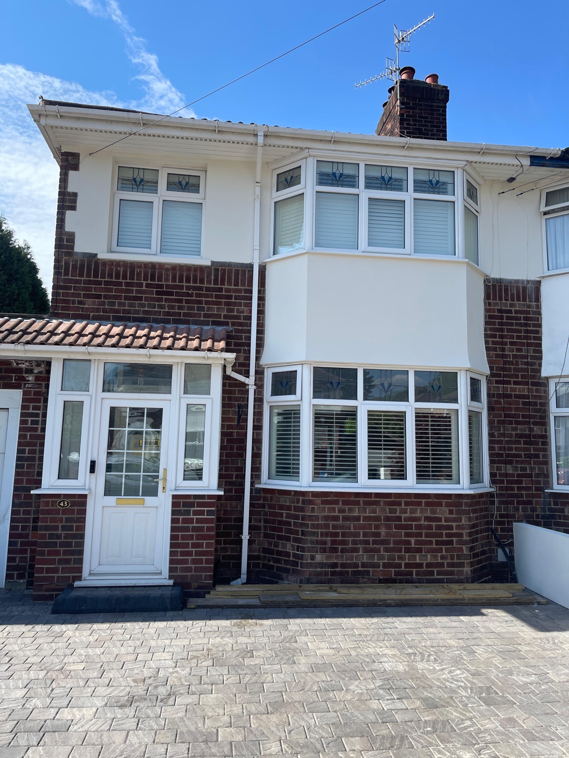 Red brick Liverpool property with freshly painted exterior woodwork by Fresh Finish Decor